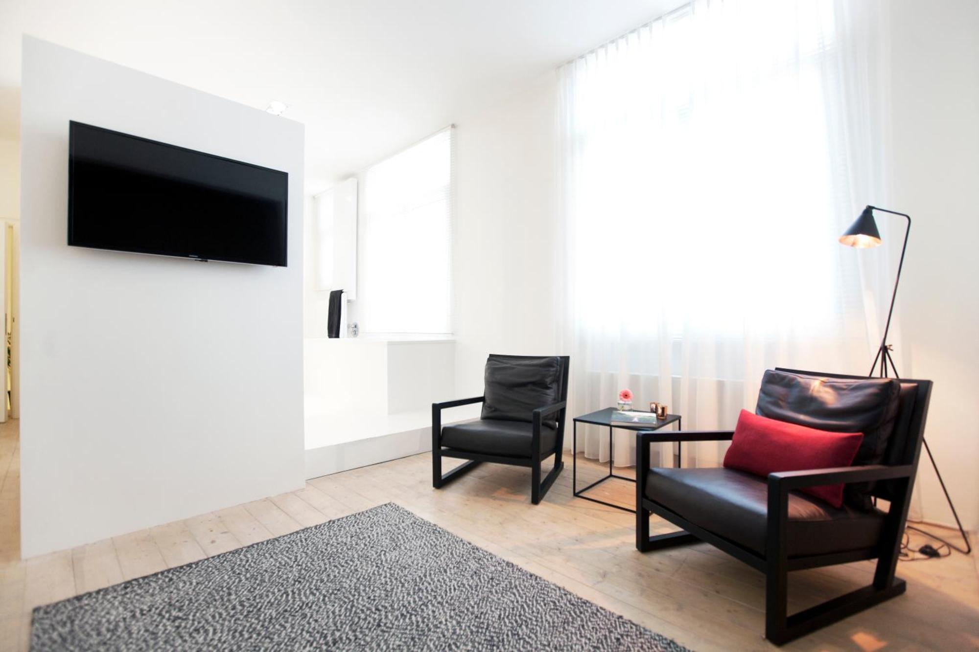 Maison Nationale City Flats & Suites 안트베르펜 객실 사진 A room at the hotel
